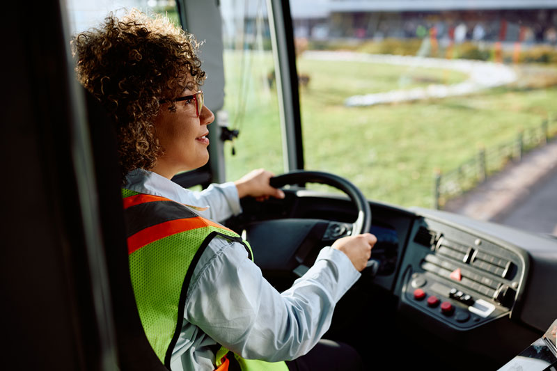 Bus driver in a modern cockpit – digitalisation and telematics ease the workload in public transport.